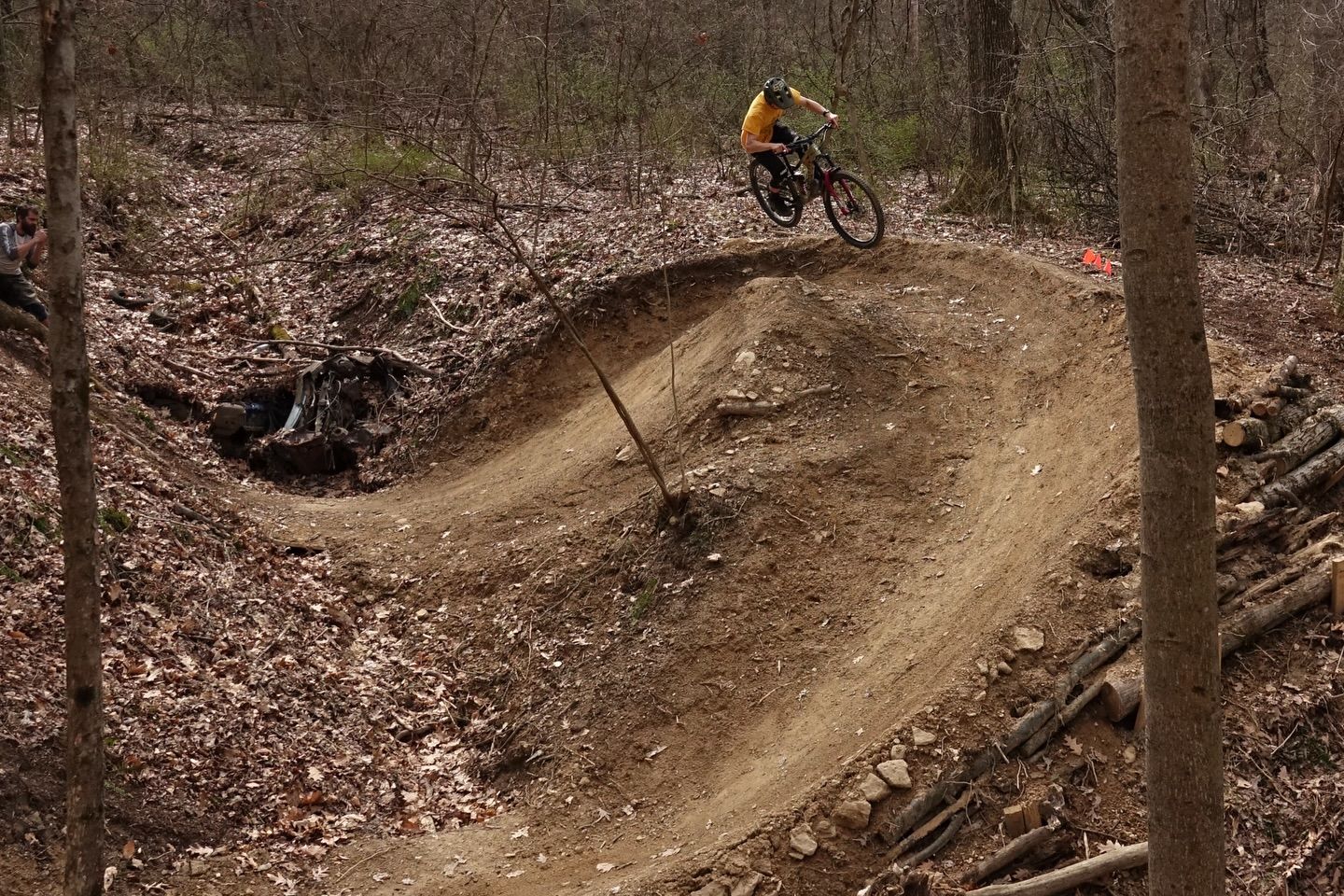 mountain bike riders in the woods