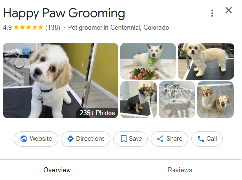 Happy Paw Grooming Google listing with photos of groomed dogs.