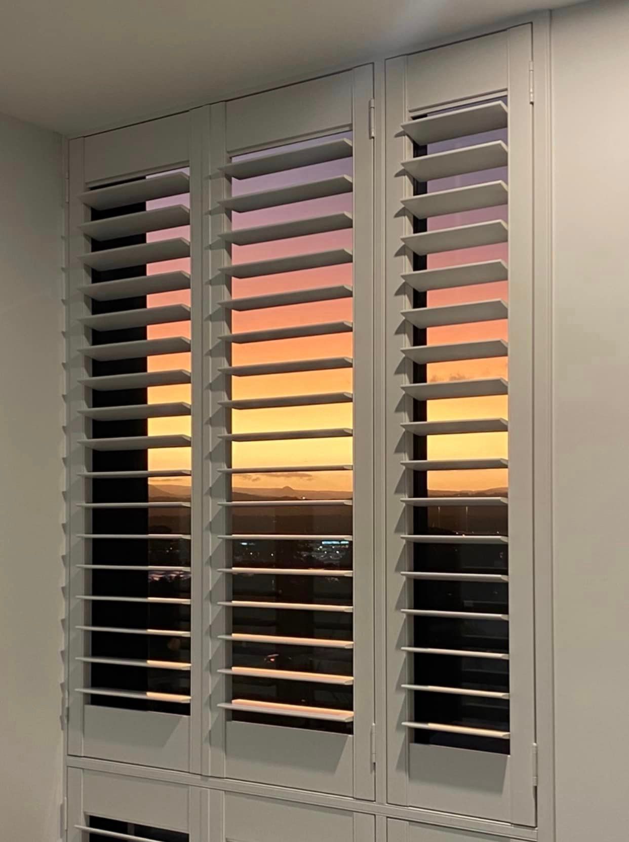 Sunset Reflected in Window Shutters — Shutters in Gold Coast, QLD