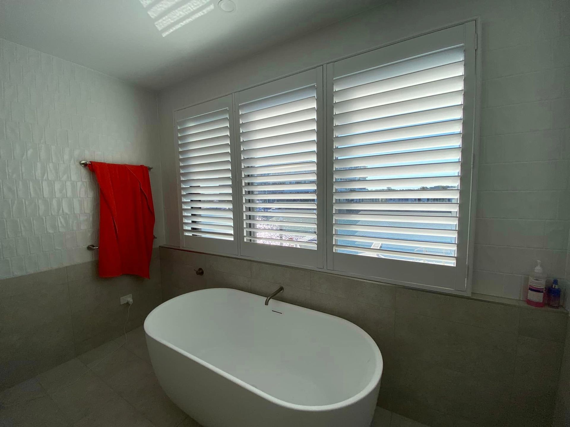 Bathtub with Stylish Window Shutters — Shutters in Gold Coast, QLD
