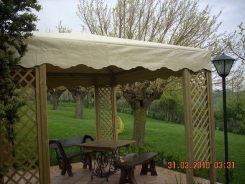 Gazebo per giardini con tende