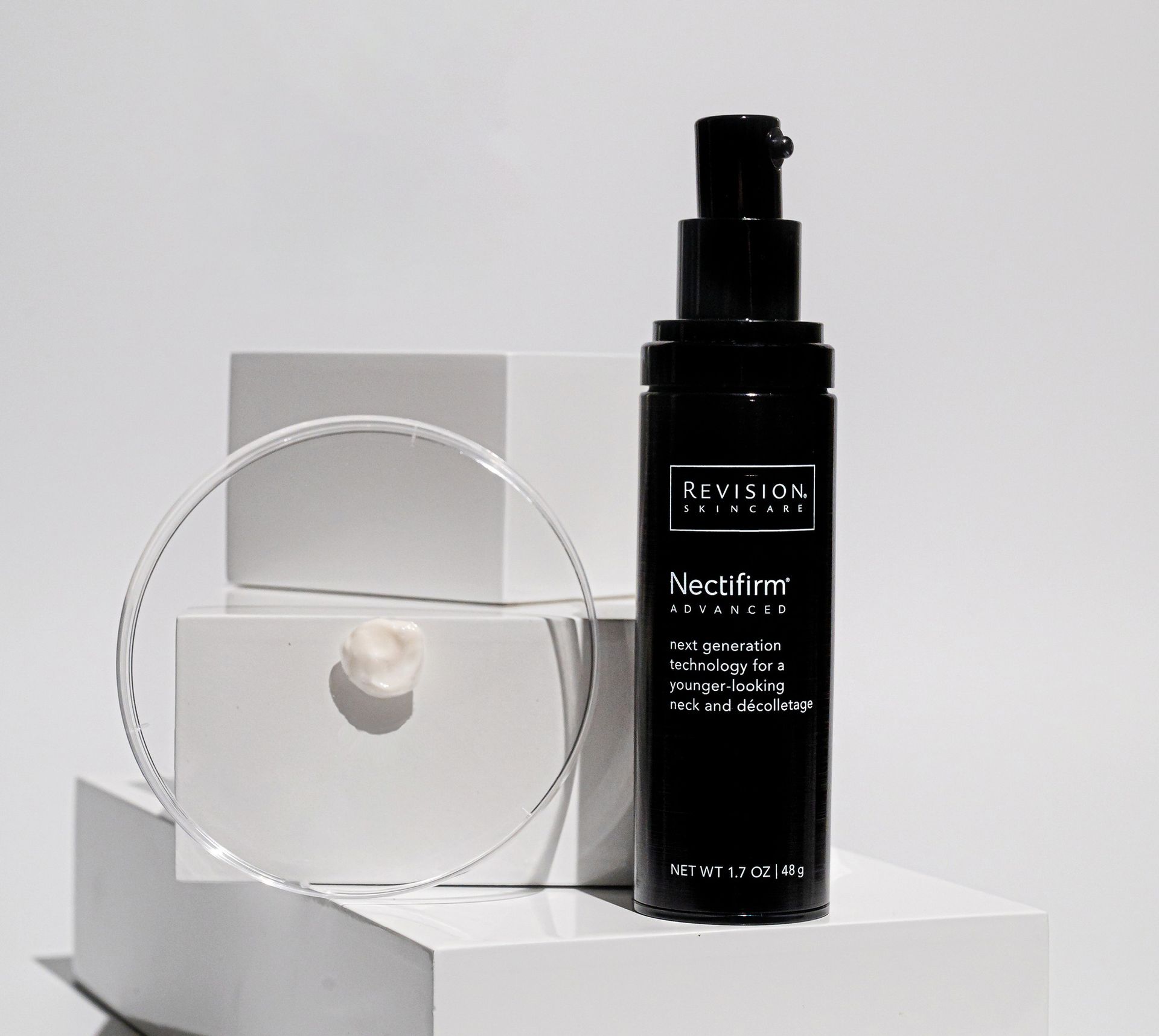 a bottle of hexatox next to a jar of hexatox and a syringe .