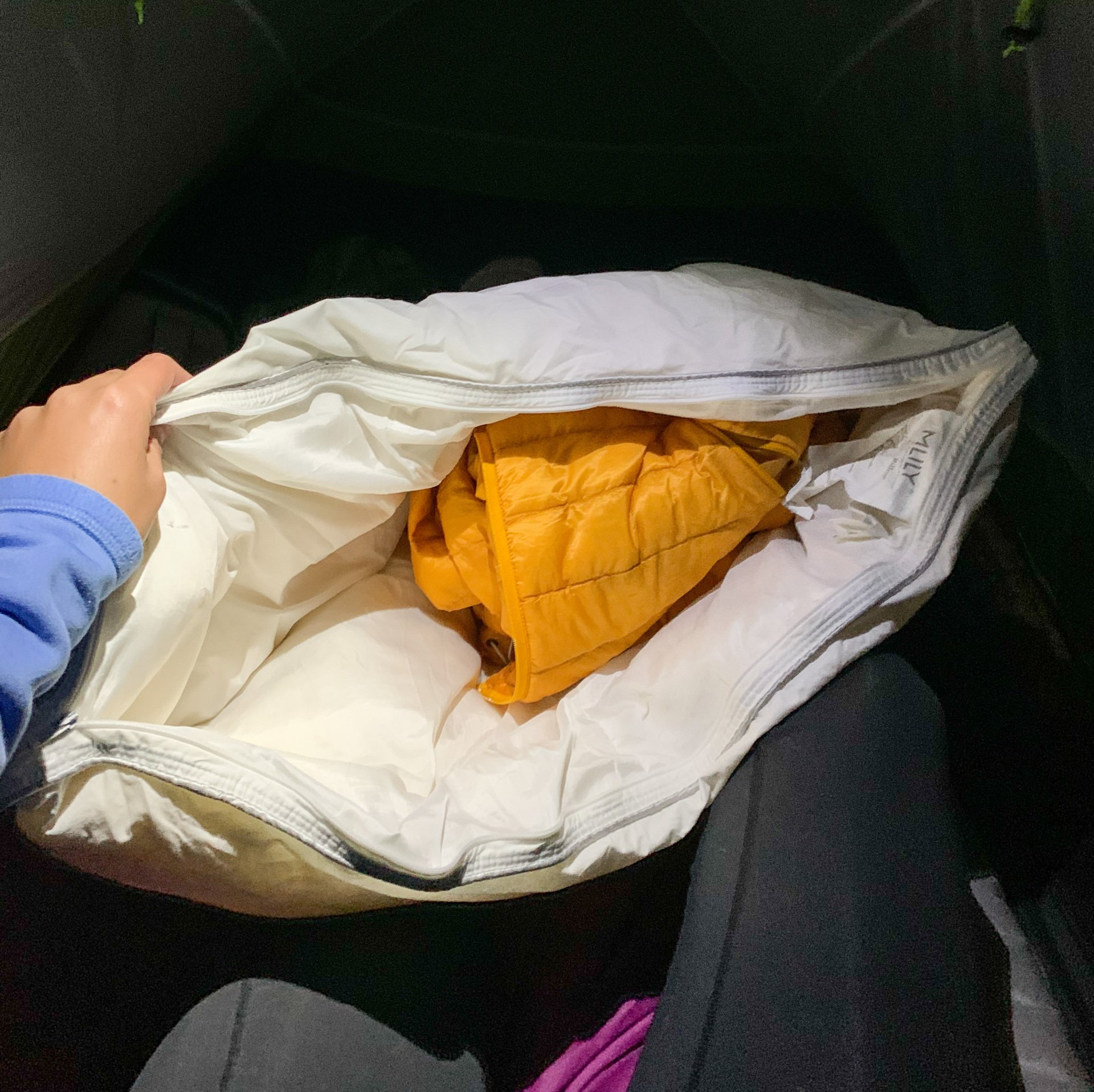 my sleeping system for backpacking - down pillow case stuffed with a puffy jacket - a great outdoor pillow