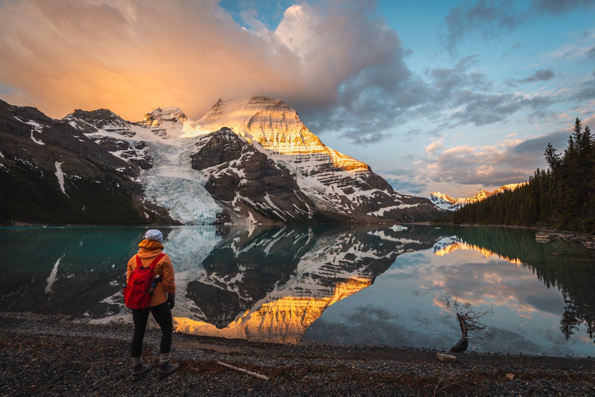 Sunrise on Berg lake, mt Robson park, BC, Canada. Turquoise lake and mountains touched with first rays of morning sun