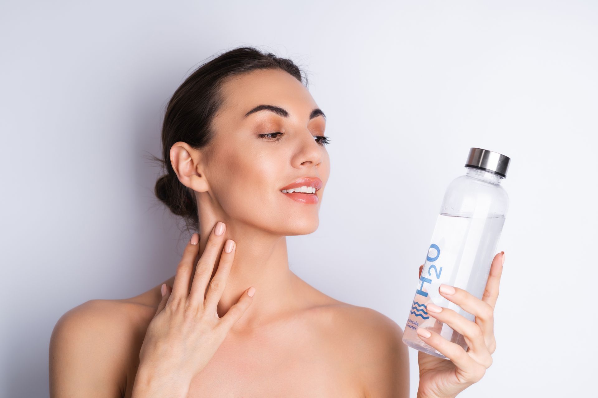 A skincare specialist applying a hydrating treatment to nourish and moisturize the skin during a relaxing facial session