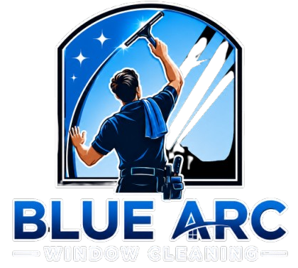 Blue Arc logo with a window cleaner using a squeegee over a blue window silhouette