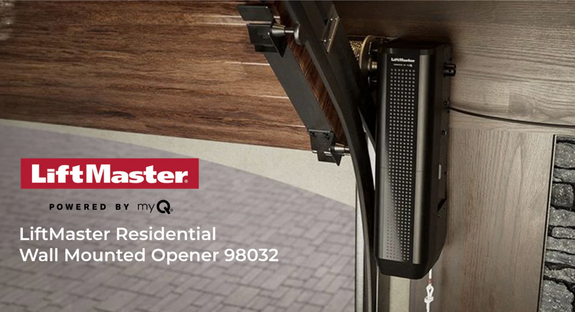 LiftMaster wall-mounted garage door opener with branding and iQ logo installed on a wood ceiling. LiftMaster wall-mounted garage door opener with branding and iQ logo installed on a wood ceiling.