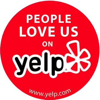 A circular red logo with white text reading