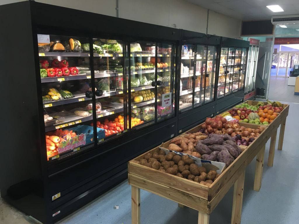 Produce Aisle: Refrigerated Display Cases of Fruits — Don Hall Air Conditioning & Electrical in Smithfield, QLD