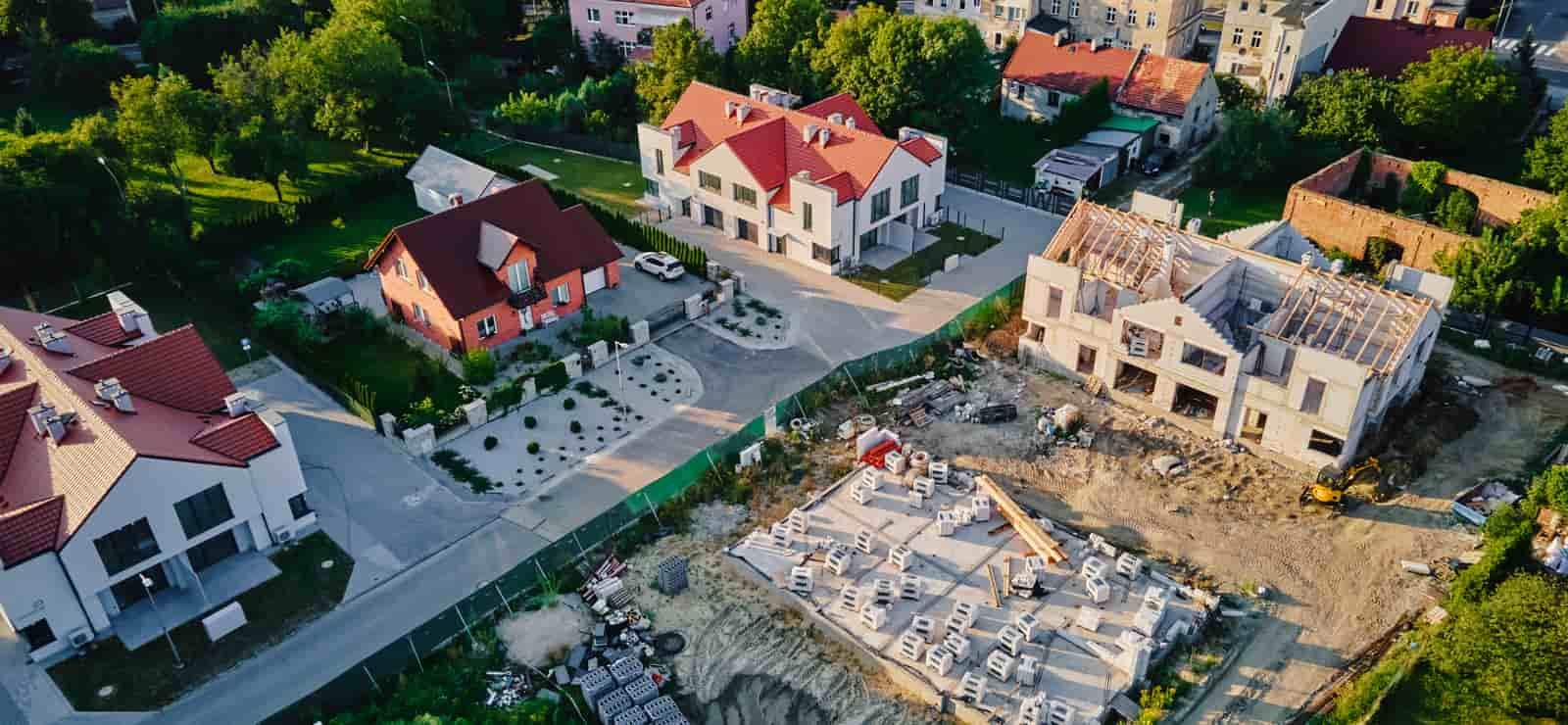 Roof Replacement in Waldport, OR - aerial view of homes and a building site
