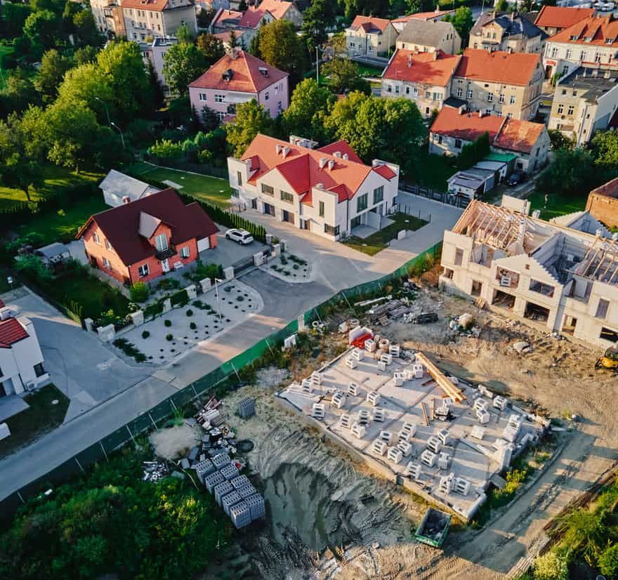 Roof Replacement in Waldport, OR - aerial view of homes and a building site
