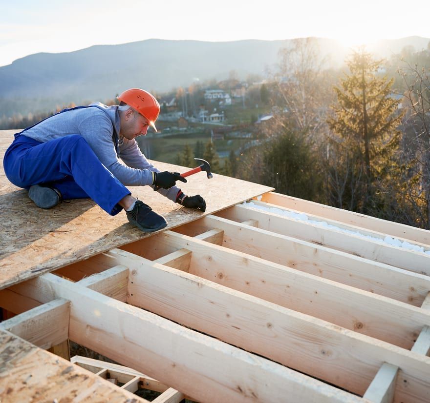 Roof Replacement in Waldport, OR - carpenter installing roof decking