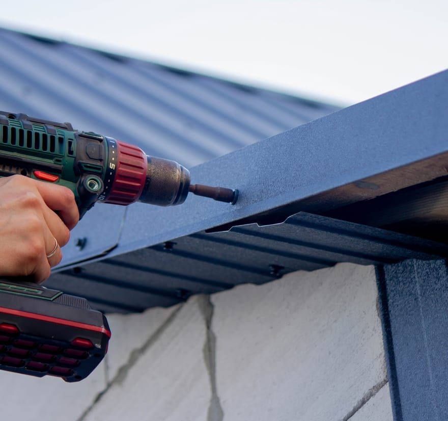 Roof Replacement in Yachats, OR - drill fastening metal roof trim