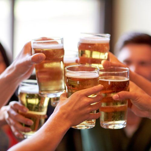 People Clinking Glasses of Beer People Clinking Glasses of Beer