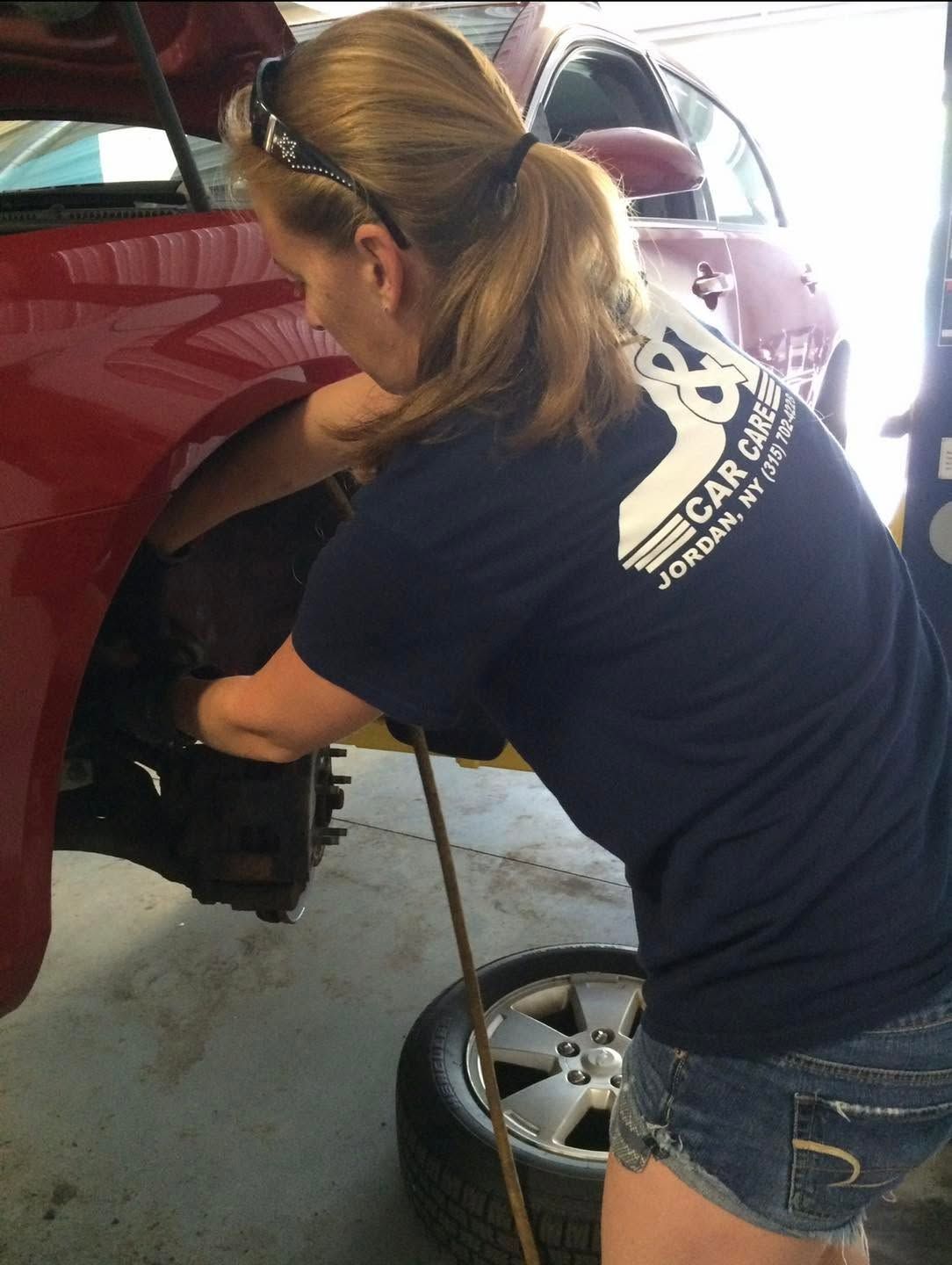 Vehicle Wheel Service On A Red Car | J&T Car Care