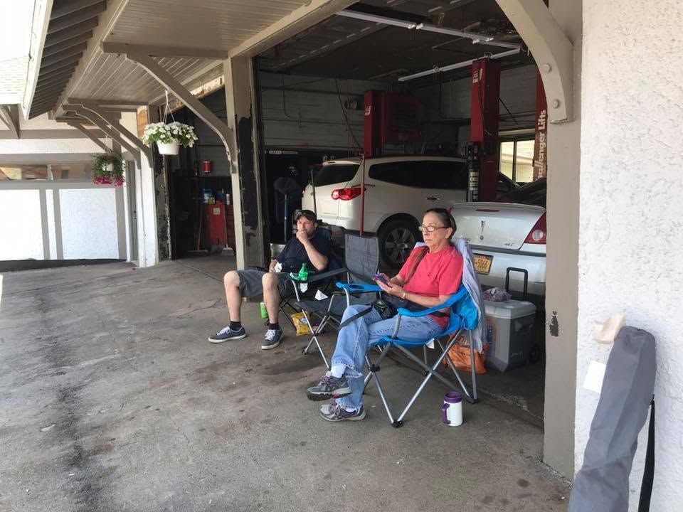 Customers Seated Outside The Auto Repair Service Bay | J&T Car Care