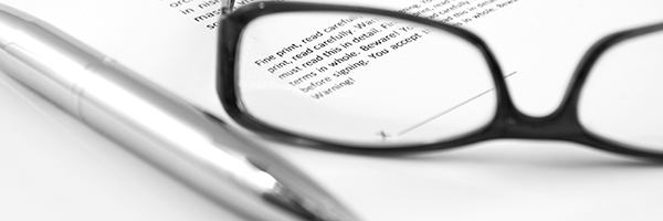 eyeglasses and pen