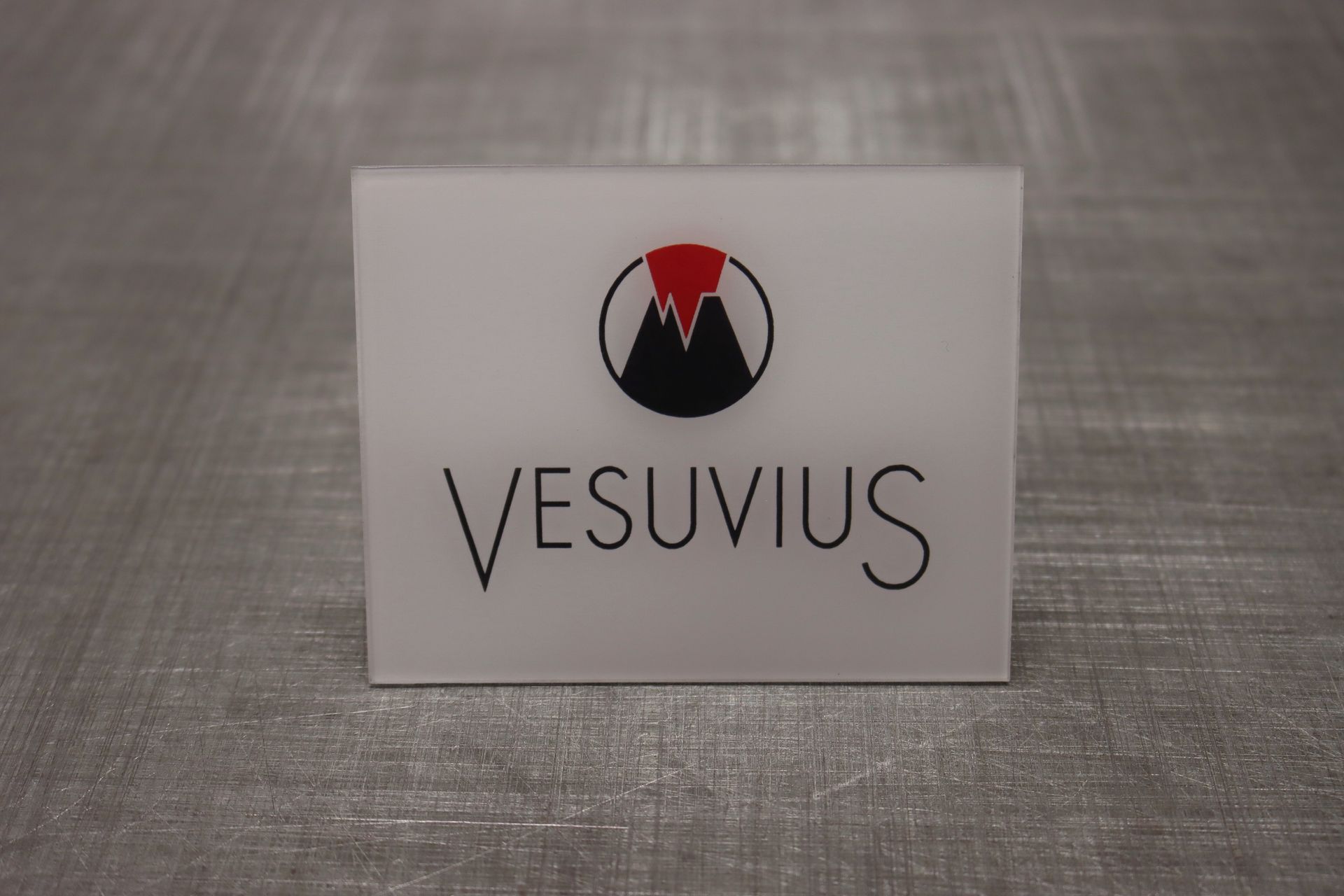 A white sign that says vesuvius on it 