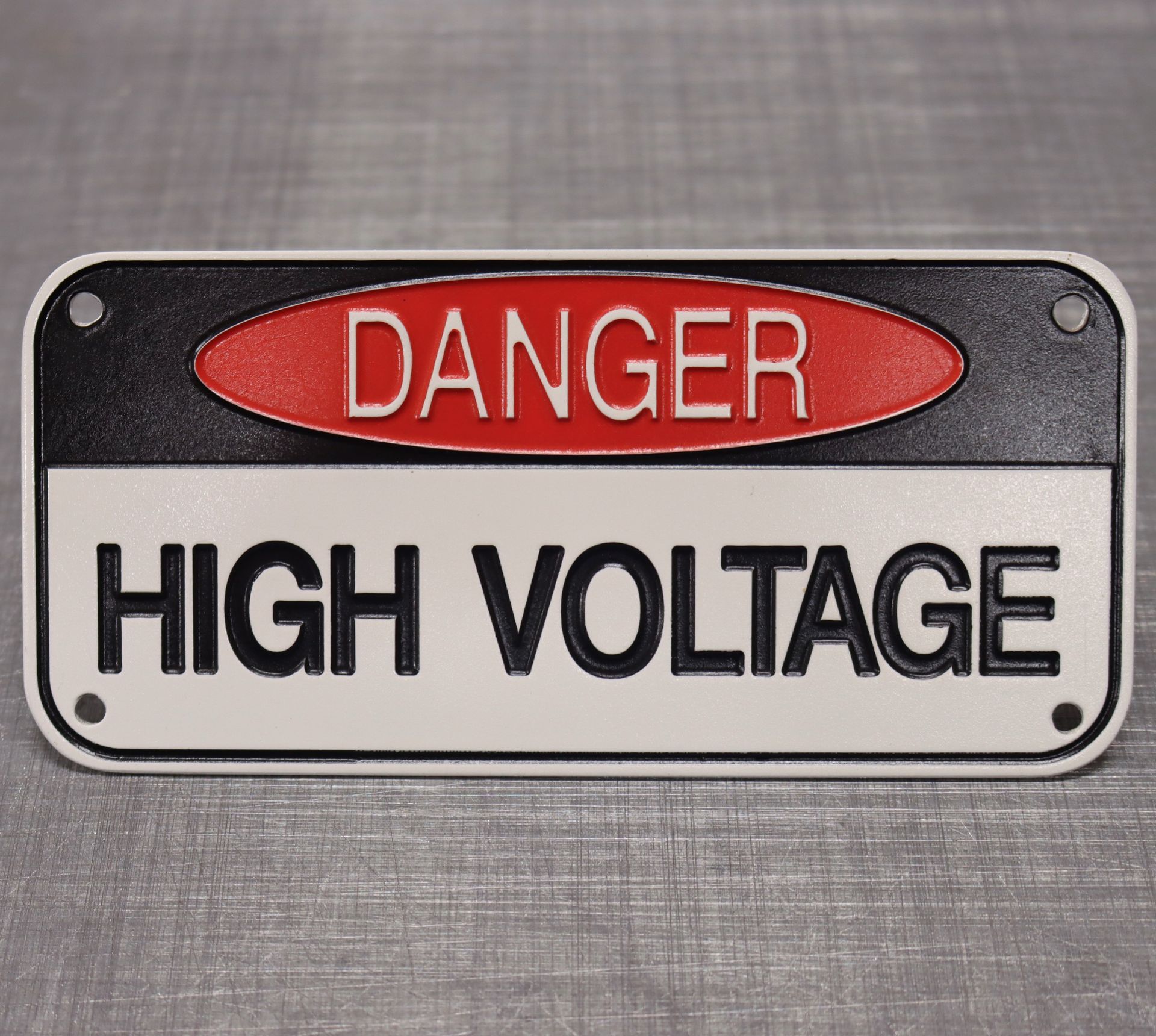 A Danger Sign Warning People to Keep a Safe Distance from The Base of A Sand Dune — Brookes Engraving & Signs in Wollongong, NSW