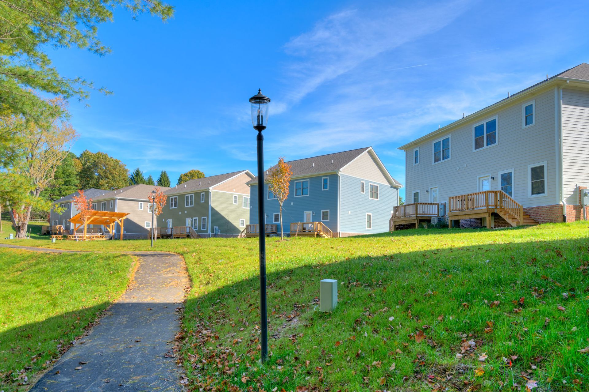 A path leads to some Roost Real Estate properties in Blacksburg, Virginia. 