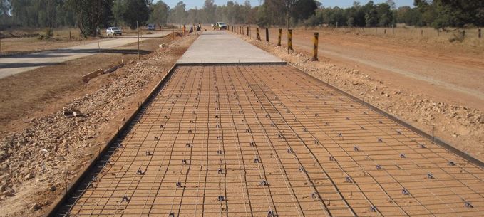 Truck Driving on Asphalt Road Along the Green Fields | Townsville, Qld | North Queensland Concrete Solutions