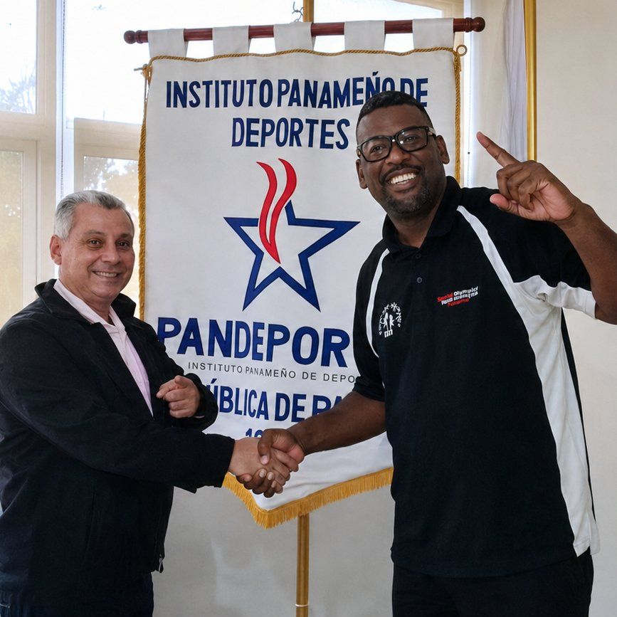 Coach Andre beside a PanDeportes representative and banner