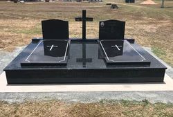Black granite double headstone with a cross — Mackay Monumental Masons In Glenella, QLD