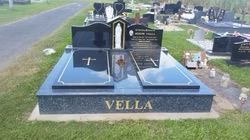 Dark granite headstone with 