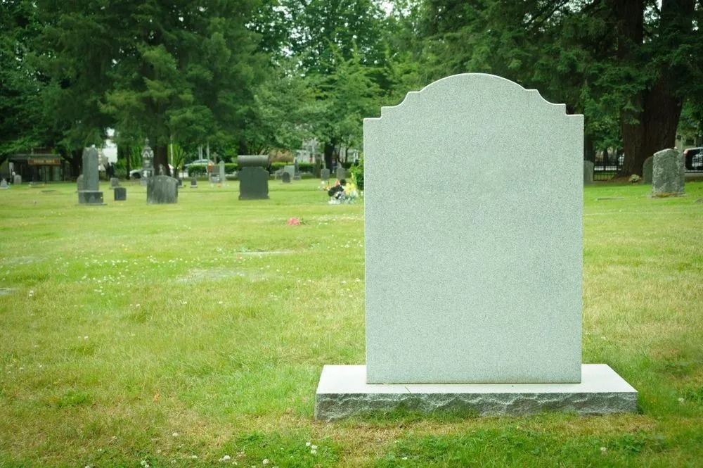 Blank Gray Tombstone in Cemetery