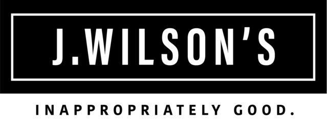 Black-and-white J. Wilson’s logo with the slogan “Inappropriately Good.”