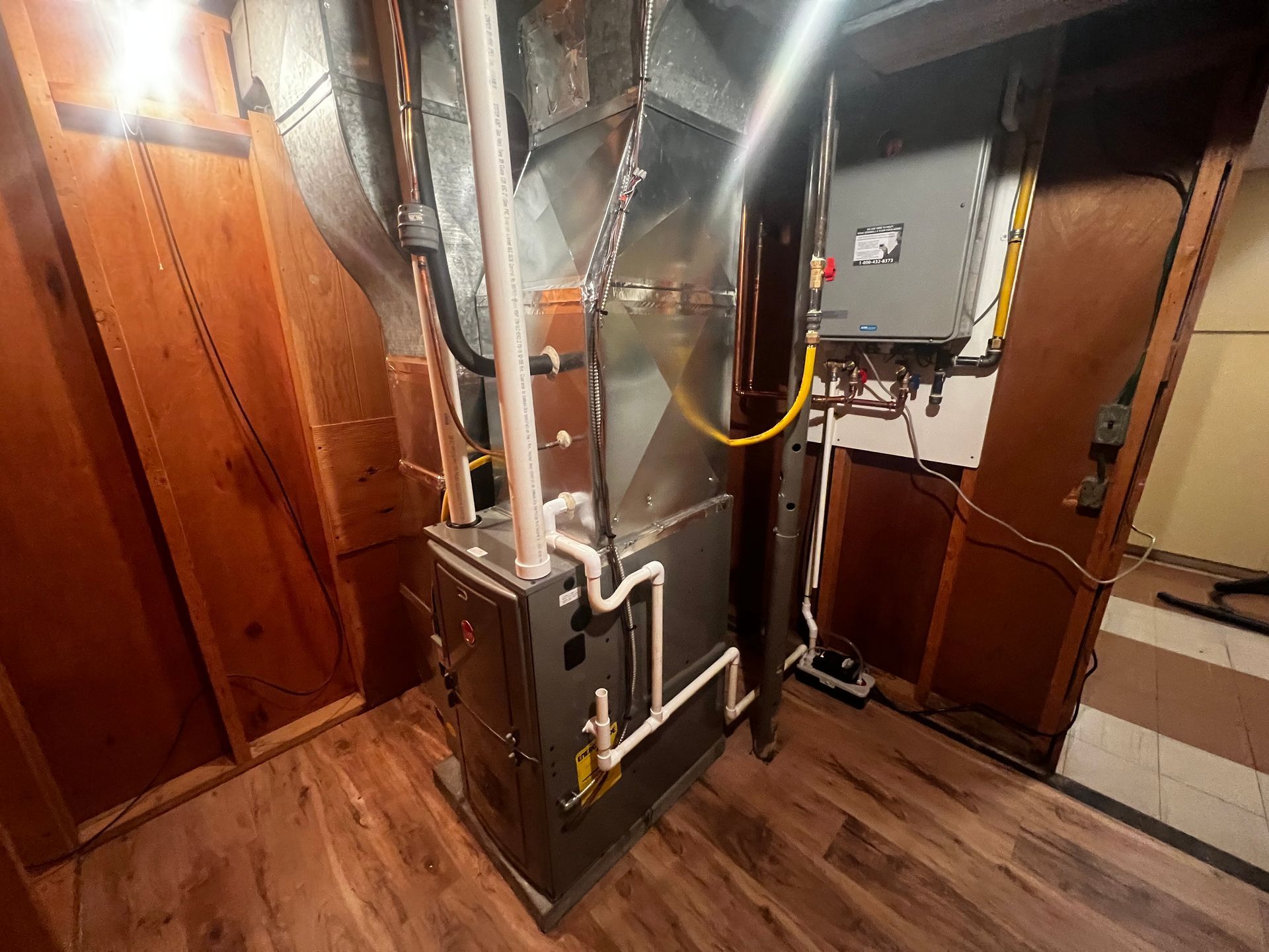 There is a furnace in the corner of the room.