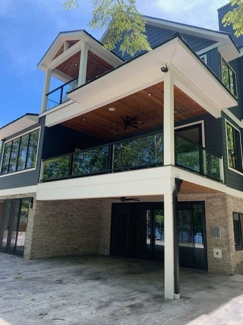 A large house with a lot of windows and balconies