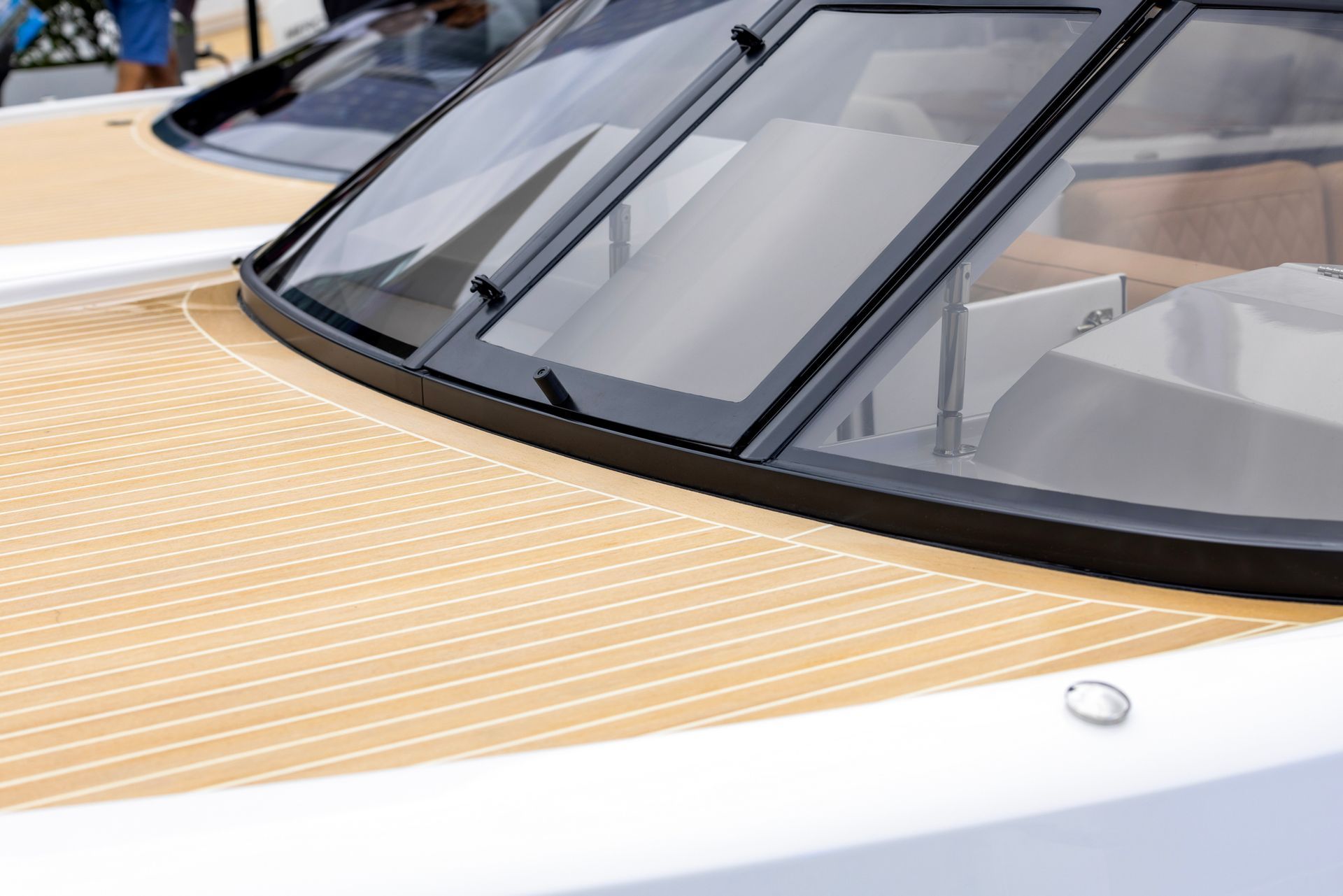 Closeup of front part of a boat showing windows.