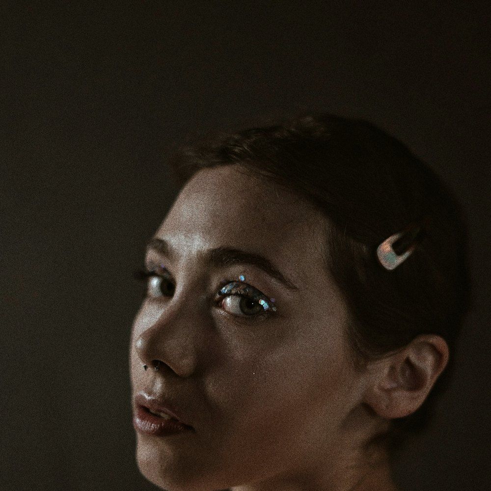 A close portrait of clear, well hydrated skin in natural light, no makeup.