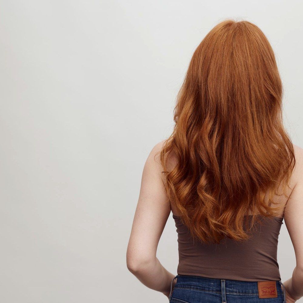 Scalp density being examined between treatment sessions