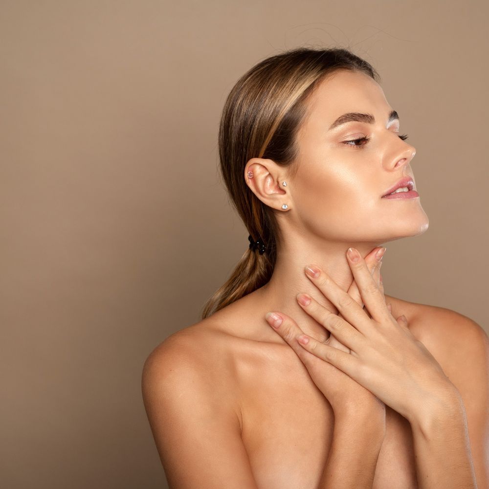 Neck and decolletage being assessed before a course of gentle rejuvenation treatment
