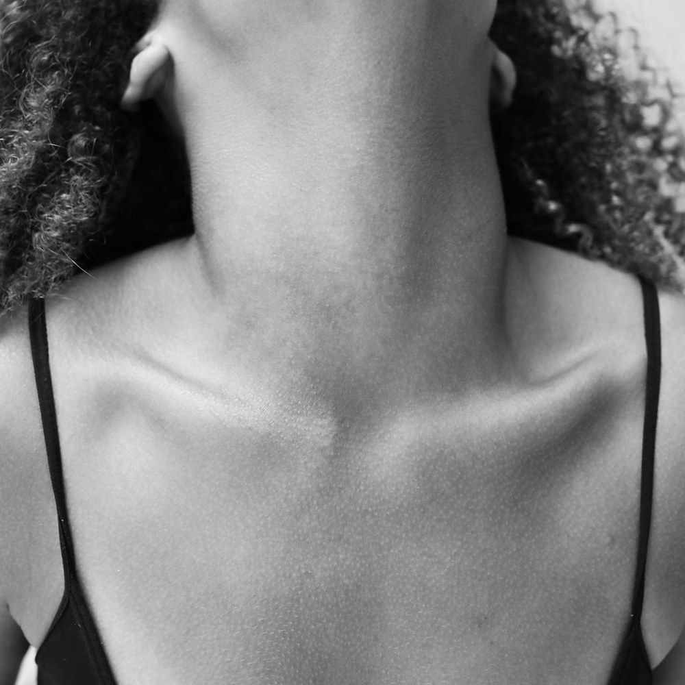 Skin along the jawline being assessed before a skin tightening course at AgeSmart in New City, New York