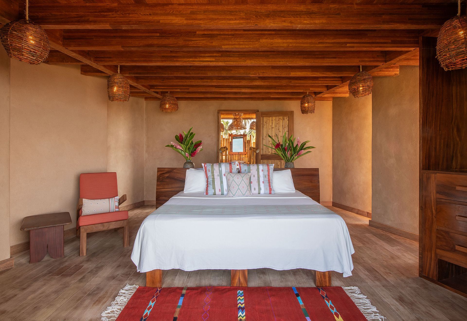 There is a large bed in the middle of the room.