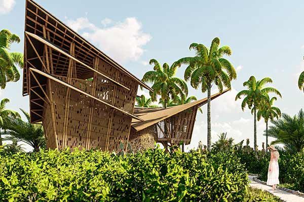 Modern bamboo resort with palm trees and lush greenery under a bright sky