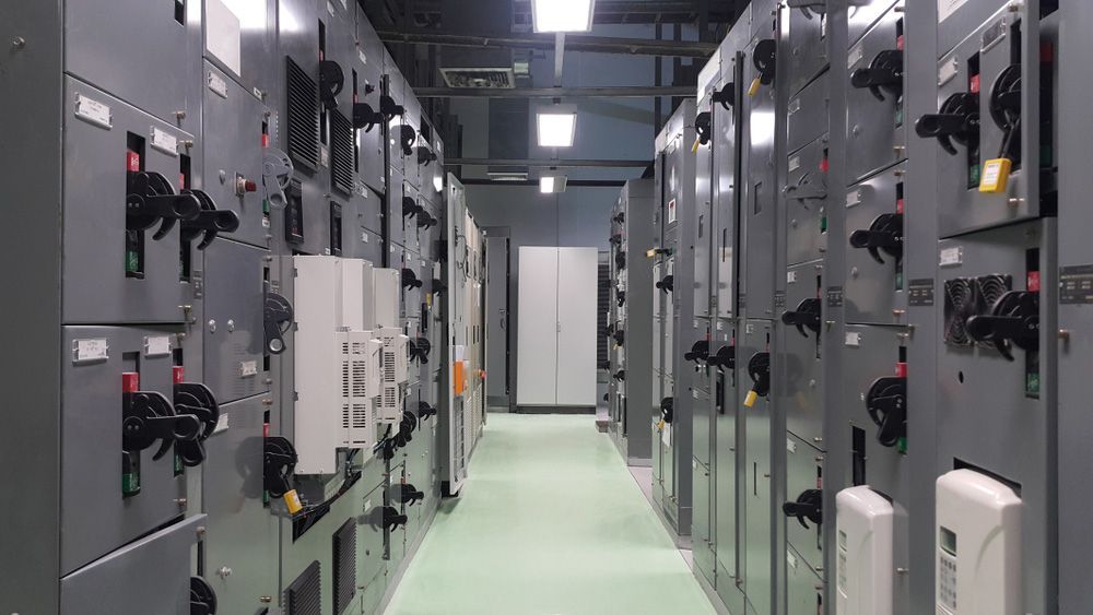 A Long Hallway Filled With Lots Of Electrical Boxes And Switches — Wylec In Newcastle, NSW