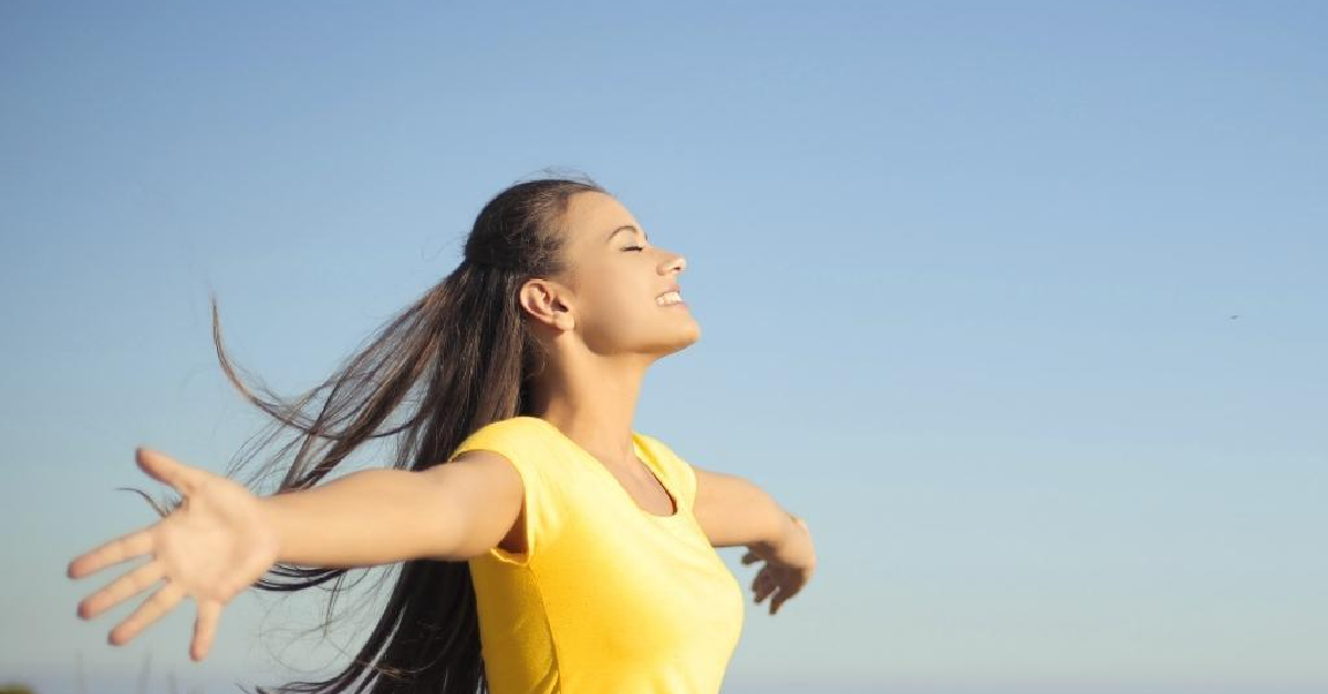 Woman Taking Deep Breath |Commercial Air Purifiers| PuraAir Australia