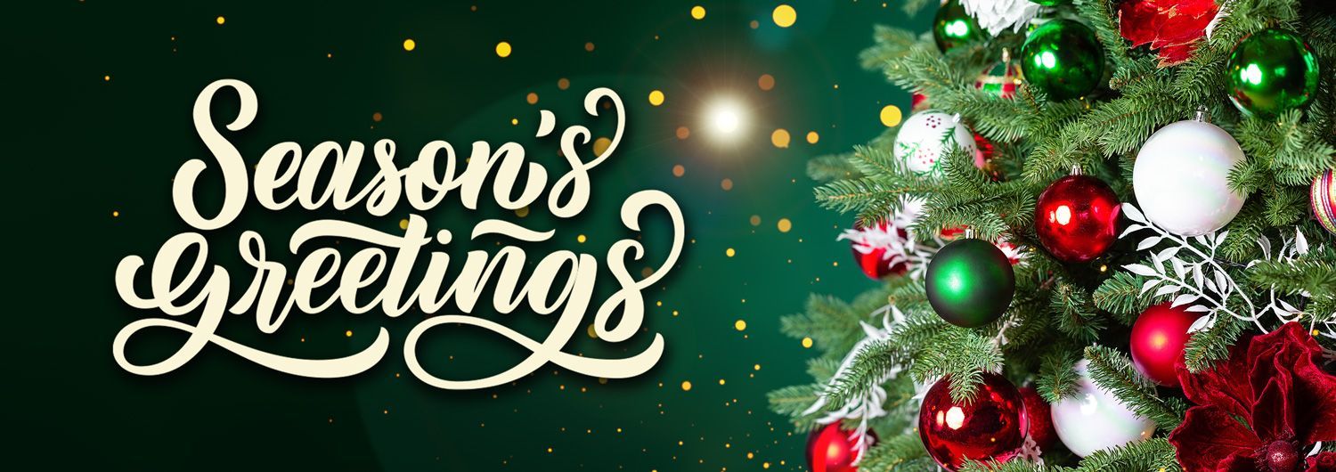 Season's Greetings text on a dark green background with a decorated Christmas tree.
