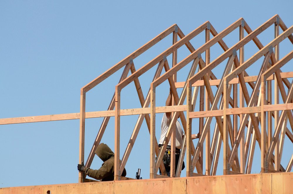 Construction Framing Contractor Installing The Roof Truss — Trussted Frames & Trusses in Port Stephens, NSW