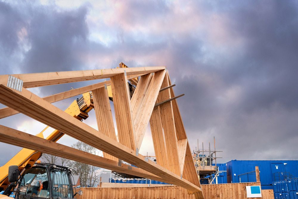 Heavy Machinery Shifting Roof Trusses On New Residential — Trussted Frames & Trusses in Warners Bay, NSW