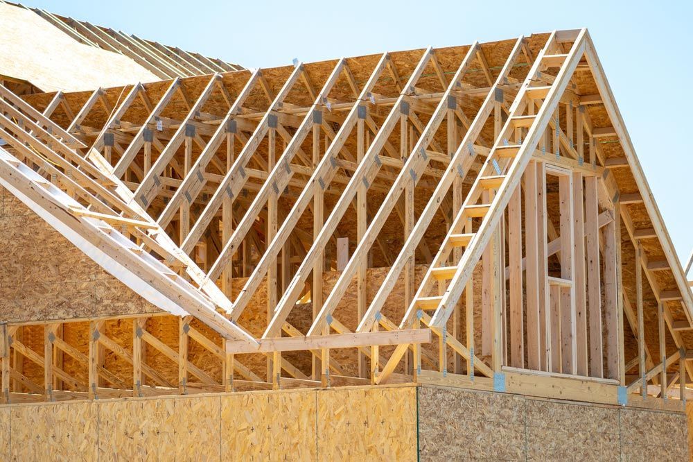 Plywood House Rafters Roof Wooden House Framework — Trussted Frames & Trusses in Maitland, NSW