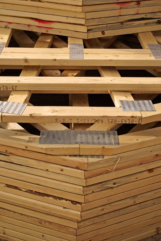 A Pile of Wooden Pallets Stacked on Top of Each Other — Trussted Frames & Trusses in Bennetts Green, NSW