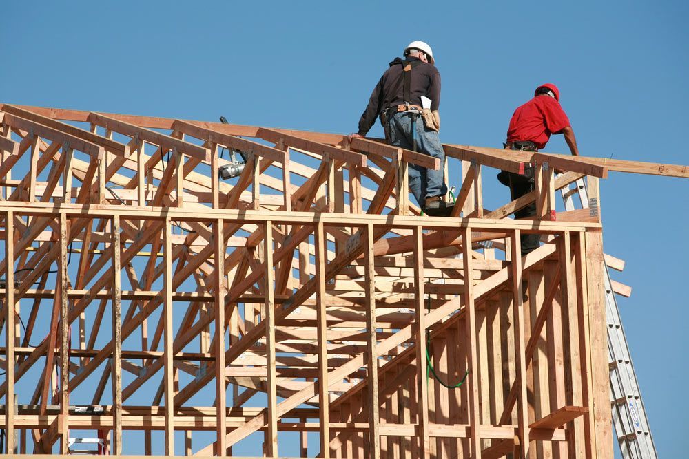 Construction Workers Work On Framing A Building — Trussted Frames & Trusses in Singleton, NSW