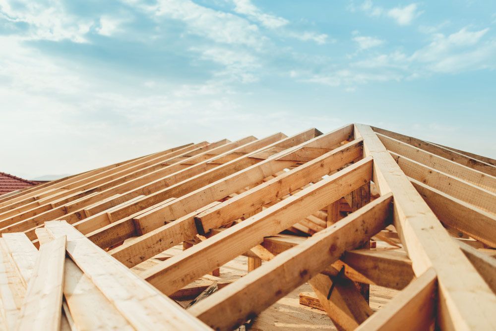 Roof System With Wooden Timber, Beams And Shingles — Trussted Frames & Trusses in Warners Bay, NSW