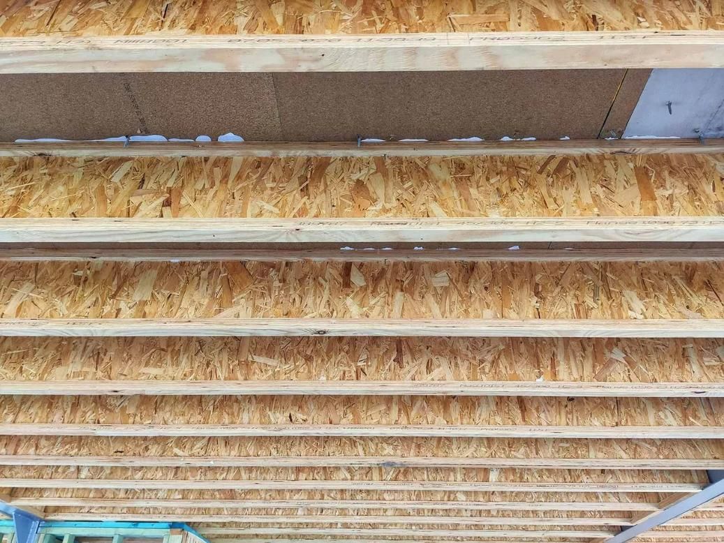 A Close up Of a Wooden Ceiling in A Building Under Construction — Trussted Frames & Trusses in Tamworth, NSW