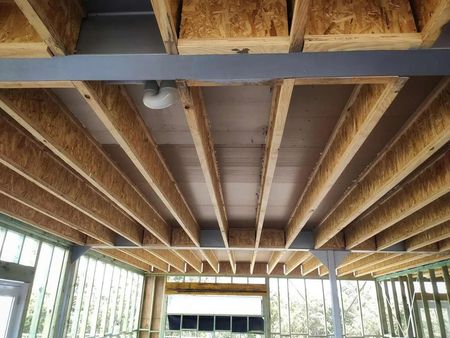 The Ceiling of A Building Under Construction with Wooden Beams — Trussted Frames & Trusses in Bennetts Green, NSW